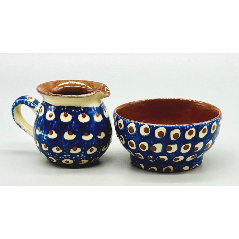 Polish Redware Pottery Creamer and Sugar Bowl Blue Peacock Eye Pattern